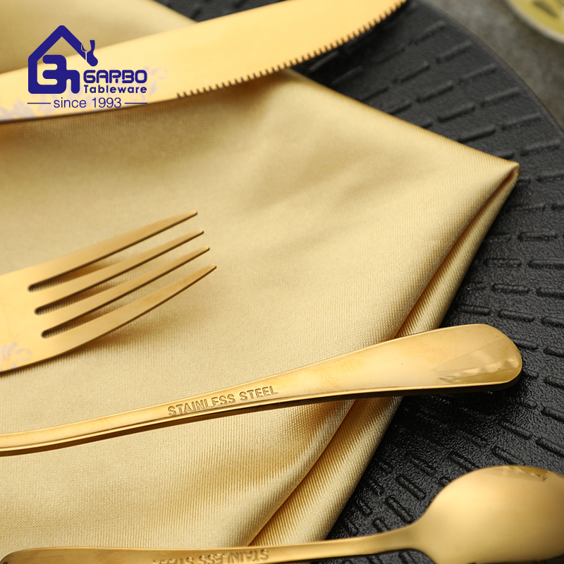 Gold 4pcs cutlery sets with laser flower design in handle 