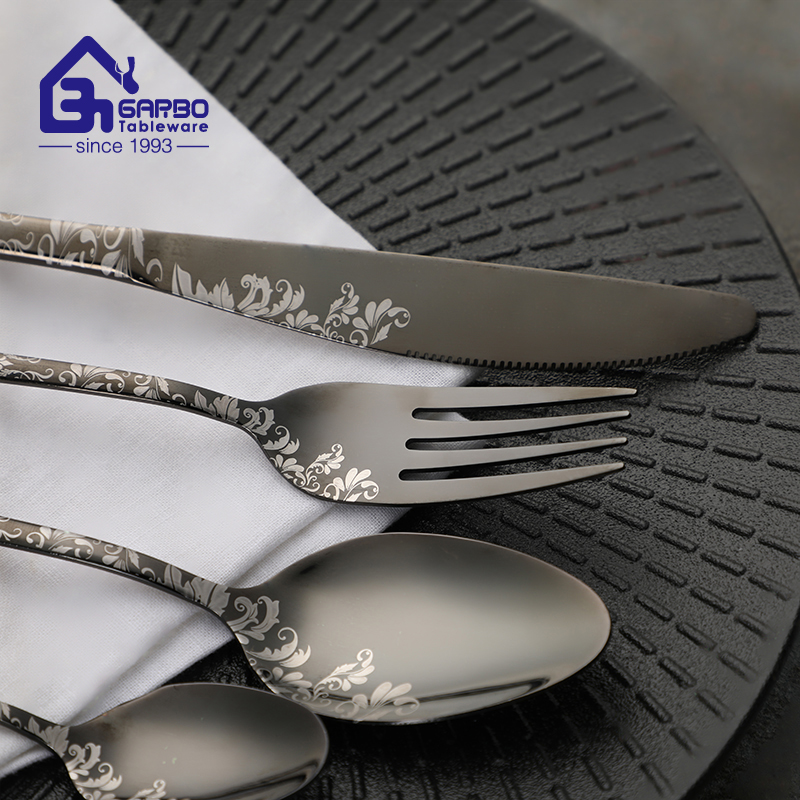 Gold 4pcs cutlery sets with laser flower design in handle 