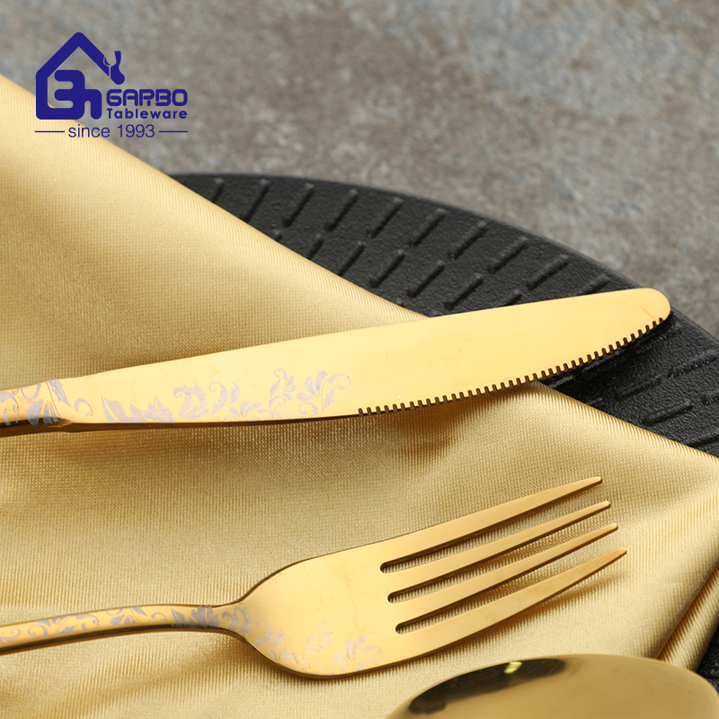 gold and black color flatware with 4pcs china supplier 