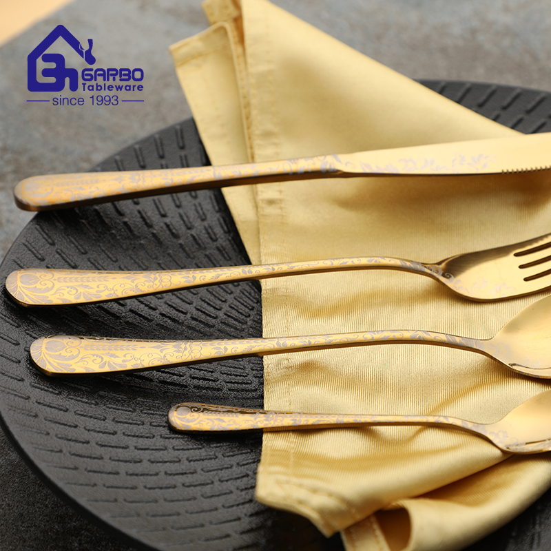 gold and black color flatware with 4pcs china supplier 