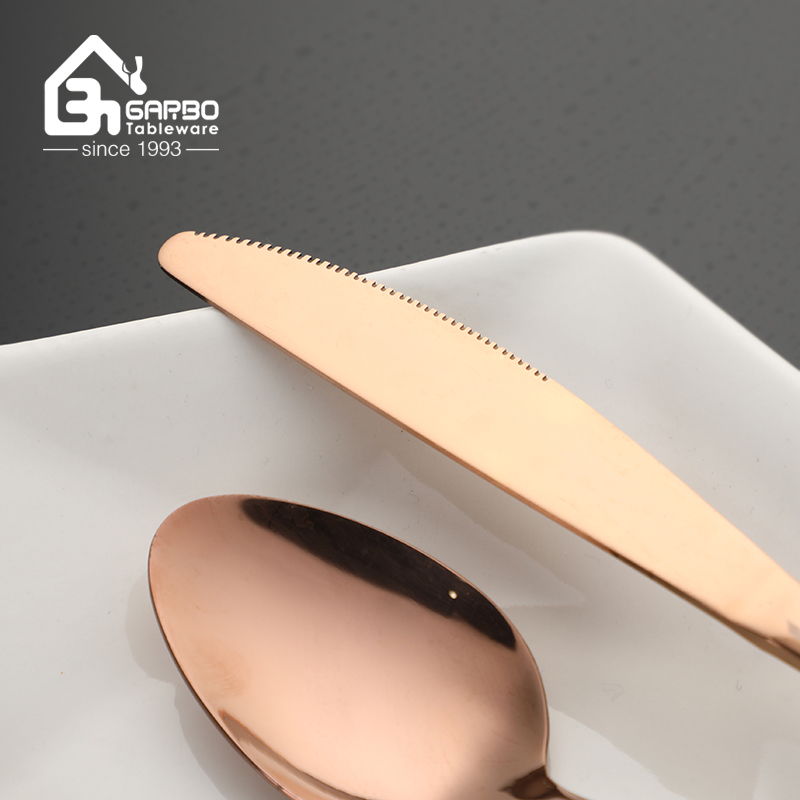 rose golden dinner spoon with laser design handle 
