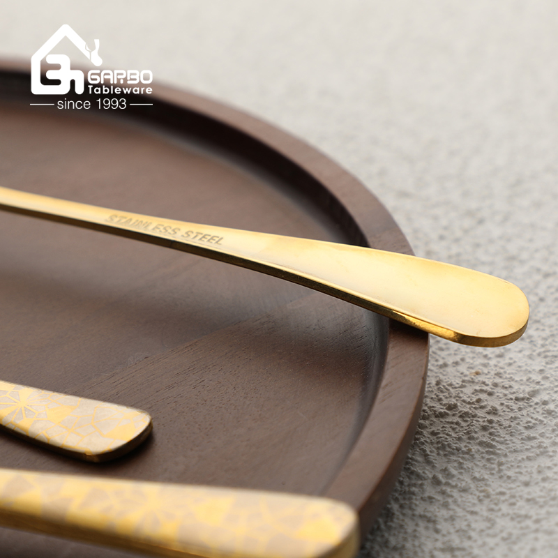 rose golden dinner spoon with laser design handle 