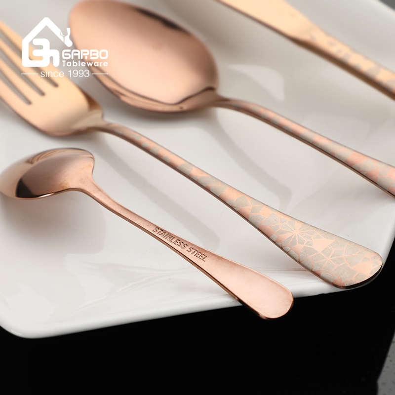 rose golden dinner spoon with laser design handle 