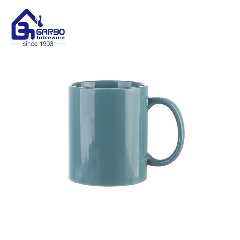 Taza de consumición del gres de cerámica azul de la tabla del hogar de la taza del agua con la manija grande cómoda