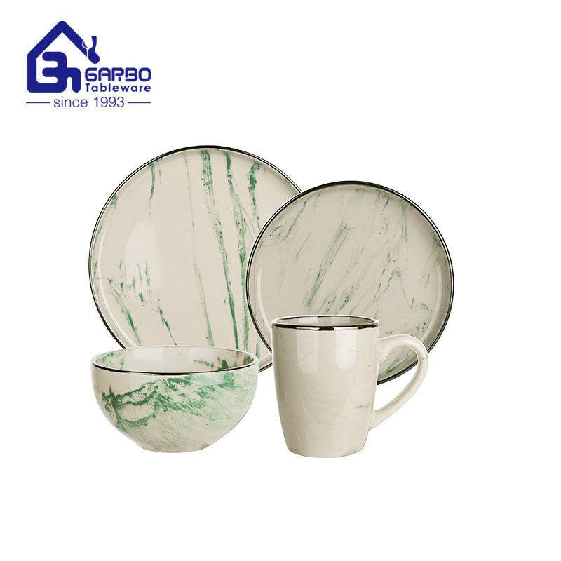 El color del gres 16pcs esmaltó los sistemas de cerámica determinados del cuenco y de la placa del servicio de mesa con la taza de consumición