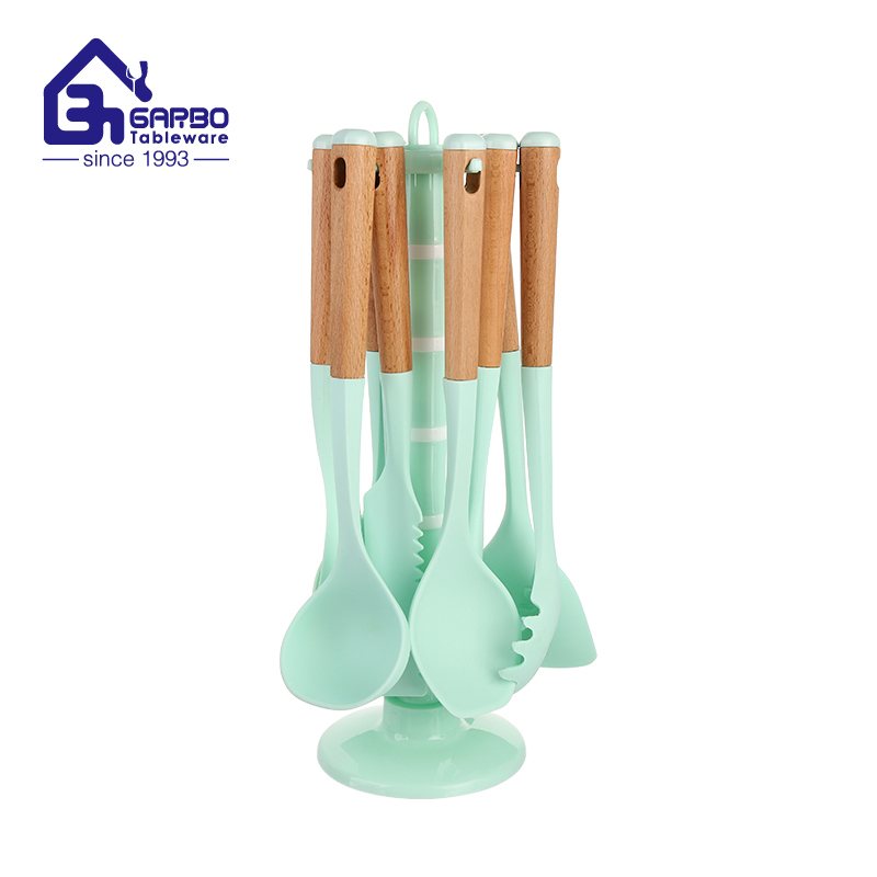 Brazil hotsell kitchen tools silicone slotted spoon with wooden handle for wholesale