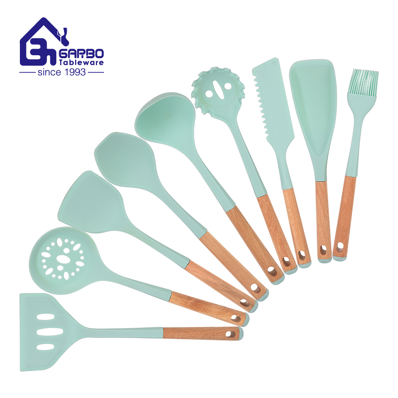 Brazil hotsell kitchen tools silicone slotted spoon with wooden handle for wholesale