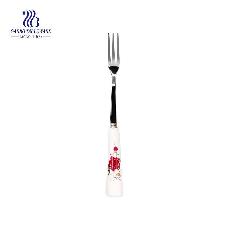 Mirror polished stainless steel table fork with ceramic handle