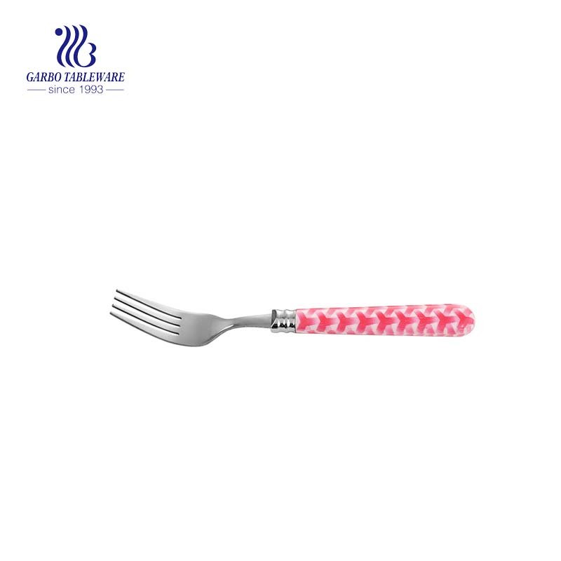 Electroplated stainless steel dinner fork with plastic handle