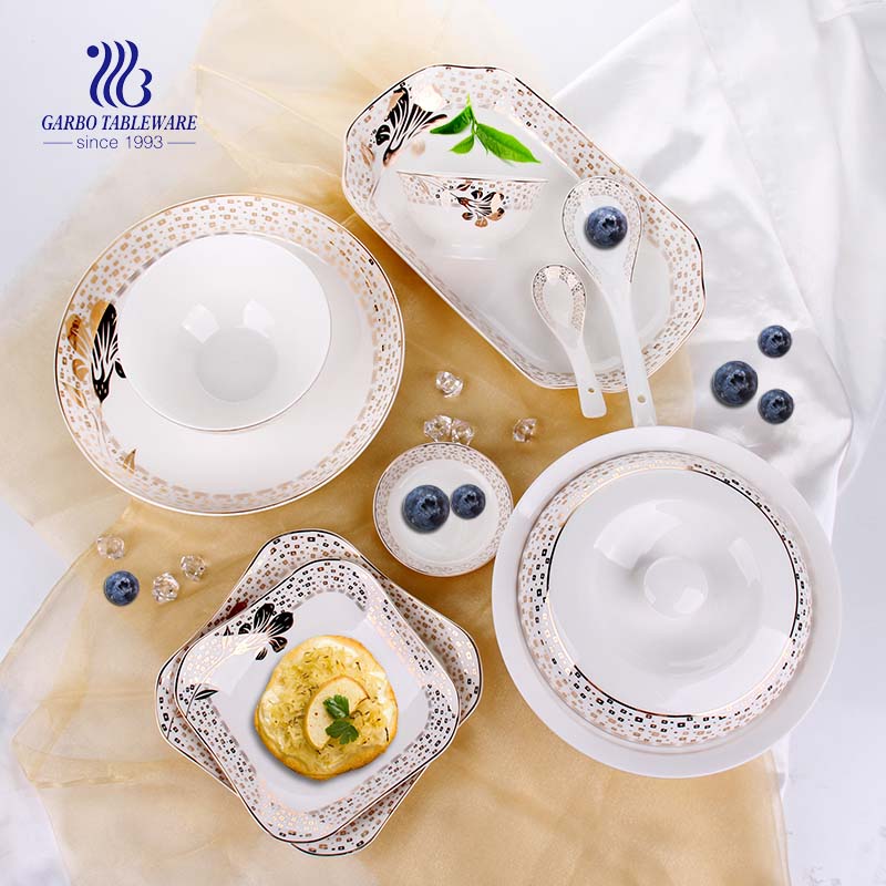 Precio de fábrica al por mayor vajilla de porcelana fina 14 piezas juego de cena de cerámica con olla de cazuela cuencos cucharas