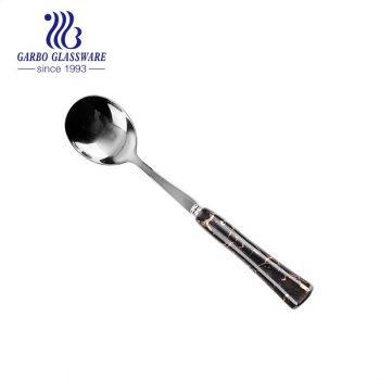 Elegant ceramic handle with golden color stainless steel tea spoon
