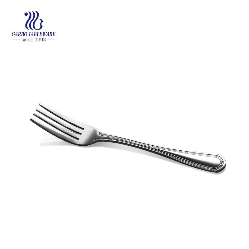 Manufacture machine pressed sliverware mirror polished stainless steel table fork with customized handle