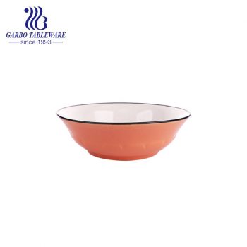 Cuenco de porcelana bajo vidriado color naranja para uso doméstico