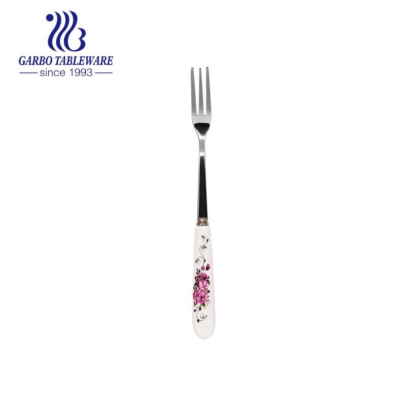 Tenedores de fruta pulidos espejo de plata al por mayor con calcomanías de flores personalizadas cubiertos con mango de cerámica para uso doméstico