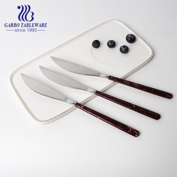 Cuchillo de cena de acero inoxidable apto para lavavajillas Cuchillo de mesa vendedor caliente con mango de diseño veteado