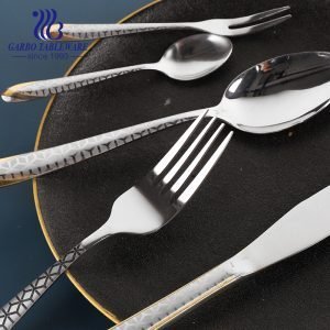 Luxury stainless steel  fork with golden decor and engraved pattern for wedding services