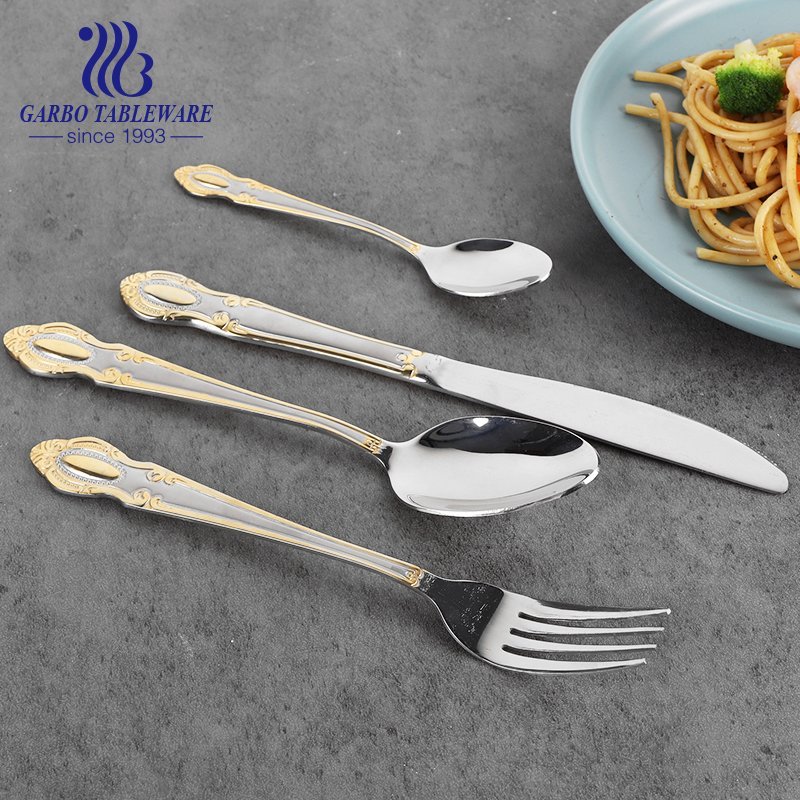 Luxury stainless steel  fork with golden decor and engraved pattern for wedding services