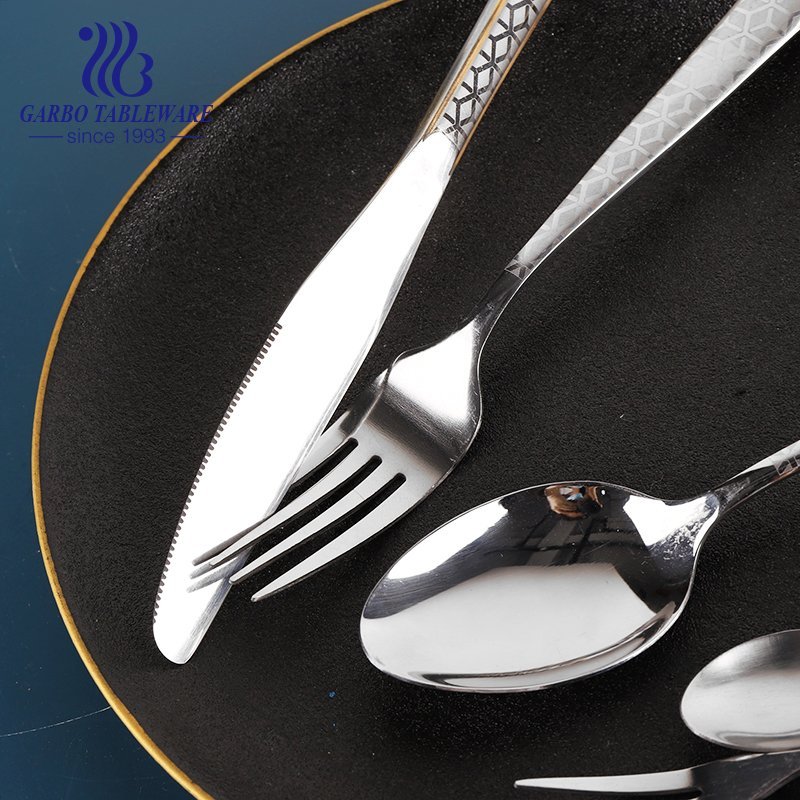 Luxury stainless steel  fork with golden decor and engraved pattern for wedding services