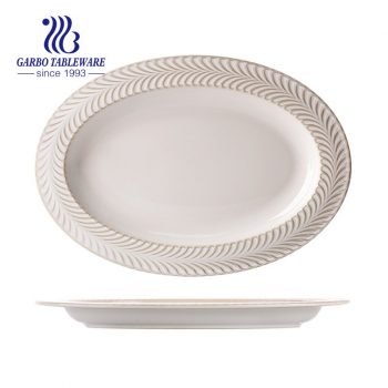 Großhandel Custom Design elegante weiße 12.5 Zoll ovale Porzellan Fischplatte mit geprägtem Design