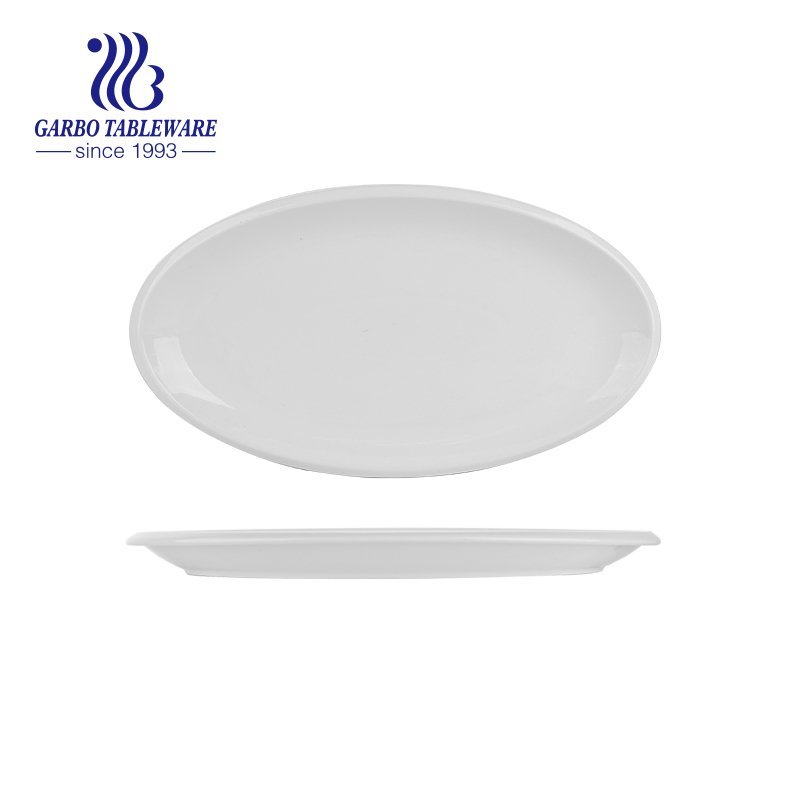 Wholesale custom design elegant white 12.5inch oval porcelain fish plate with embossed design