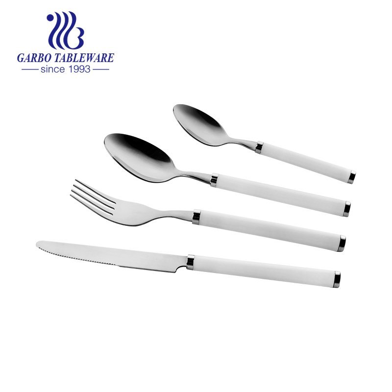 Comfortable to hold silver and gold dinner knife with white handle