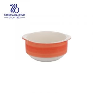 Bowl with handle and bright orange color painting for eating soup