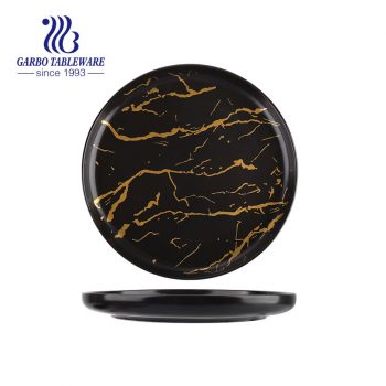 Placa de cargador de porcelana de 10 pulgadas de color negro con diseño de mármol único personalizado al por mayor para cenar