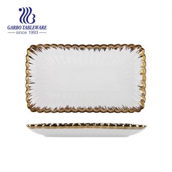 Venta al por mayor, plato de porcelana rectangular grande real único de 12 pulgadas con borde dorado