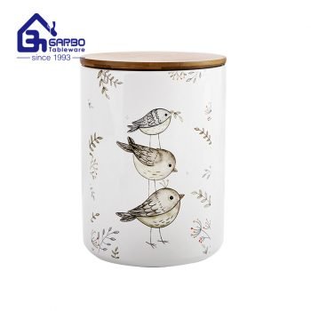 Nouveau pot de stockage de table de cuisine en céramique de mode serti de pots d'impression d'oiseaux de couvercle scellé en silicone de bambou