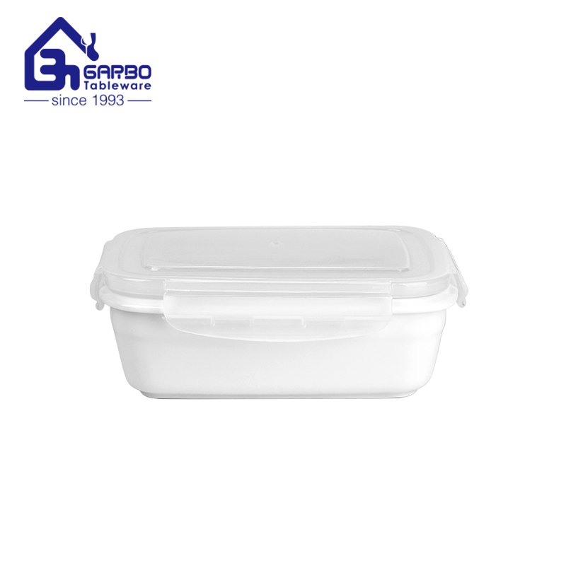 Daily use Rectangle-shaped 580ml porcelain food container Microwavable ceramic lunch bowl OEM printing design with PP lid